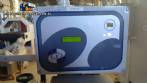 Etiquetadora automtica autoadhesiva para botellas cilndricas