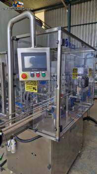 L�nea de llenado completa con m�quinas Tecman Nelpas Tecnoenvase Tudela para el llenado, etiquetado, taponado y posicionamiento de botellas de l�quidos cosm�ticos.