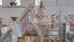 Sistema de llenado de polvo con transportador de silo de tornillo y llenador de tornillo