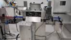 Lnea para llenado de salmuera, insercin manual de producto y taponado automtico