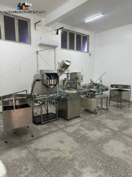Línea de envasado, conteo y tapado de cápsulas y otros productos Línea de envasado, conteo y tapado de cápsulas y otros productos