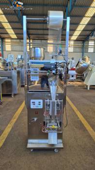 Máquina dosificadora y envasadora de productos granulados y en polvo. Máquina dosificadora y envasadora de productos granulados y en polvo.
